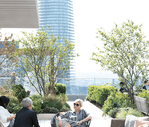 People relaxing on the terrace at Canary Wharf